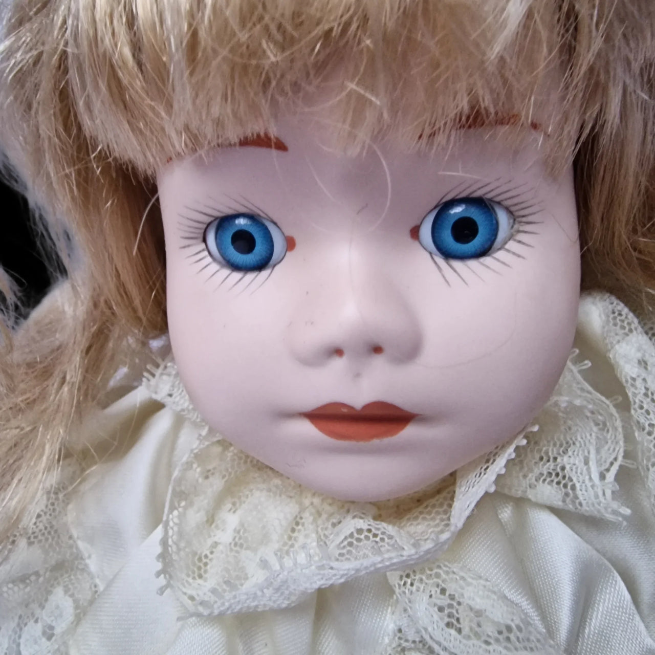 White top porcelain doll
